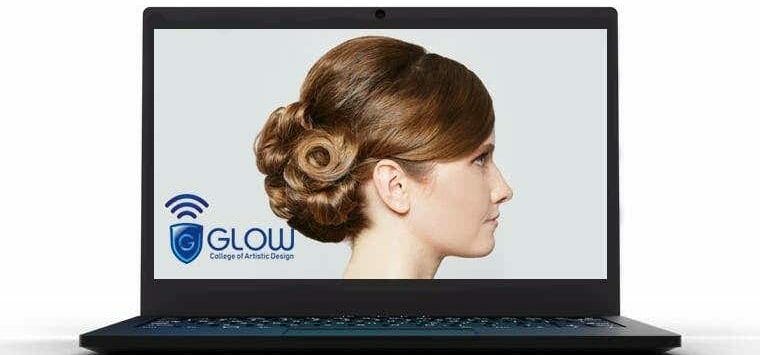 GLOW College laptop with an image of a woman with a modern hairstyle. 