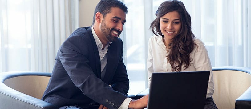 Financial aid advisor going over funding options with a female student.